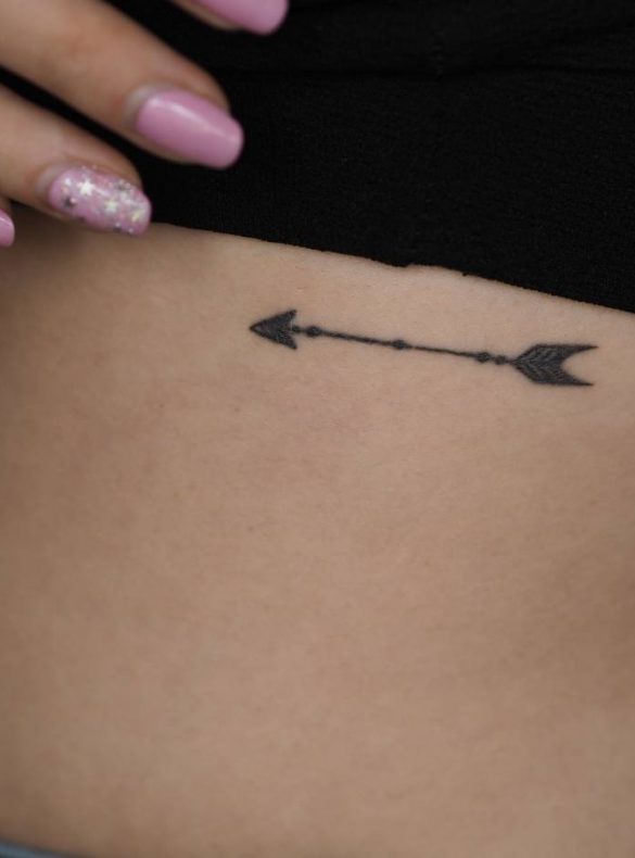 arrow rib tattoo