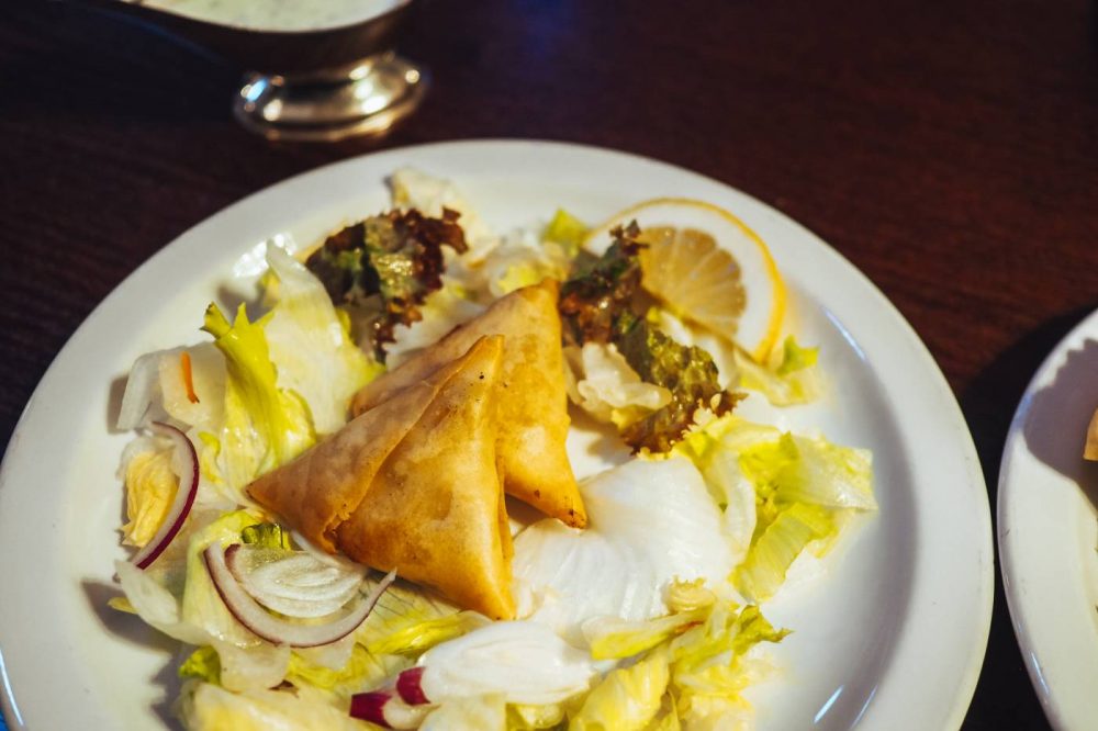 A plate of two samosas at Moza Indian, Newport Pagnell