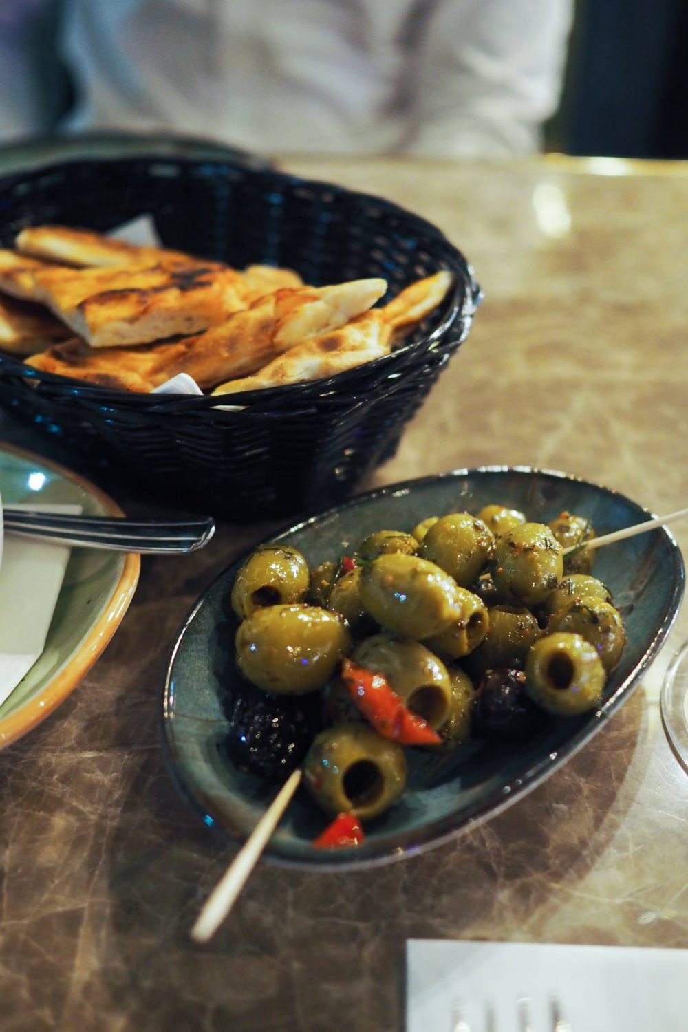 Olives and pitta at deroka restaurant