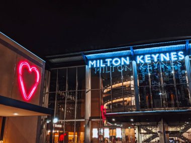 Milton Keynes Theatre and MK Gallery at night in the rain